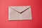 Junk mail or spam and fake letter idea. Concept for unsolicited mail or e-mail. Envelope on red background