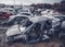Junk yard with many wrecked cars