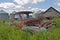 Junked truck in abandoned farmstead