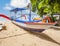 Junkung boat on beach in Bali, Indonesia with blue sky