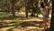 JUPITER, FLORIDA. USA - JUNE 17, 2017. Young woman doing practicing slackline on a public park in Florida