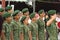 Jurong, Singapore - AUGUST 06, 2016: Boys in uniform groups saluting and standing at attention at an event