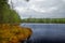 Jussi hiking trail - Black lake in autumn glow.