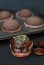 Just Baked Homebaked Chocolate Muffins for Dessert with colored Conffeti. Dark Background.