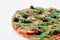 Just baked hot pizza on the white background isolated with free copy space on the left side. Vegetarian pizza with vegetables