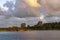 Just after a colorful sunrise, a group of geese takes off from the water of lake Zoetermeerse Plas