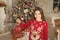 Just look at this. Christmas attributes decor. Little girl near christmas tree. Child celebrate christmas at home