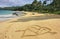 Just married written in sand