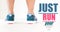 Just run your troubles away phrase in colourful letters with running shoes background. Healthy sport symbolism