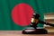 Justice and court concept in People Republic of Bangladesh. Judge hammer on a flag background