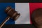 Justice mallet on France flag close up. Constitutional law. French legislation