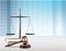 Justice Scales and books and gavel o wooden table