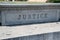 Justice Sign Carved in Stone