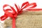 Jute sack present with red ribbon