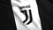 Juventus symbol on a white flag. Motion .The emblem of the Italian professional football club from Turin, one of the
