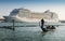 Juxtaposition of gondola and huge cruise ship in Giudecca Canal. Old and new transportation on the Venice Lagoon