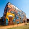 Juxtaposition of Historical Landmarks and Vibrant Street Art in Johannesburg