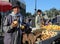 Kabul, Afghanistan: Two stallholders selling apples at the market