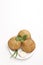 Kachori, green chilly and onion on white background. kachori is a spicy snack from India also spelled as kachauri and kachodi