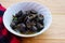 Kaeng Hoi Khom, River snails or Periwinkle curry on white bowl