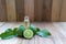 Kaffir lime or bergamot essential oil bottle with fresh bergamot and leaves