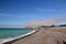 Kaikoura beach with black pebblestone and calm sea