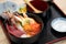 Kaisen Don Sashimi seafood Rice Bowl served in a black Bowl, Japanese food