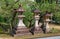 A kaku-doro traditional stone square lanterns in the Kitano Tenmangu shrine. Kyoto. Japan
