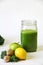 Kale apple lemon ginger juice vertical