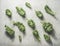 Kale pattern with raw green leaves at grey concrete kitchen table with sunlight. Healthy seasonal winter vegetable. Top view