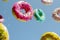 Kaleidoscope Of Flying Doughnuts Assembling An Irresistible Temptation