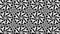 Kaleidoscope of geometric black and white patterns.