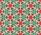 Kaleidoscope geometric red and green seamless pattern