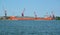 KALININGRAD REGION, RUSSIA. The Lada bulk carrier against the background of seaport