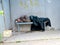 KALININGRAD, RUSSIA. Drunk elderly man sleeps on bench in stop pavilion