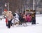 KALININGRAD, RUSSIA. A girl rides children in a sleigh harnessed by a horse