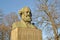 KALININGRAD, RUSSIA. Karl Marx`s bust in the twilight of spring day. The Russian text - Karl Marx