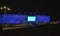 KALININGRAD, RUSSIA. A night type of Baltic Arena stadium with the indicating panel. The Russian text - Welcome.