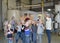 KALININGRAD, RUSSIA. A tour guide shows children equipment in a manufacturing shop. Children s tour to the chocolate factory BELGO