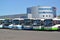 KALINNIGRAD, RUSSIA. Passenger buses stand against the background of modern shopping center