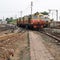 Kalka, Haryana, India May 14 2022 - Indian toy train diesel locomotive engine at Kalka railway station during the day time, Kalka