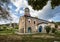 Kalofer, Bulgaria - May 9, 2018: The church Sveta Bogoroditsa, Christian temple building and Hristo Botev monument. Architecture a