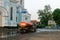 Kaluga Region, the city of Maloyaroslavets, Russia June 25, 2013: Street sprinkler in the early morning on the city street
