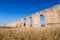 Kamares Aqueduct, Bekir Pasha Aqueduct. Larnaca, Cyprus. Sunset panorama landscape