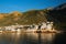 Kamares town with traditional white houses on Sifnos island on sunset. Greece