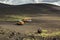 Kamaz trucks in the parking lot for tourists. North Breakthrough Great Tolbachik Fissure Eruption 1975