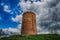 Kamenets tower in black and white style with cloudy sky on background