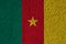 Kamerun flag on the background texture. Concept for designer solutions