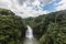 Kamikawa Otaki Waterfall and green forest in Kagoshima, Kyushu