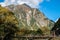 Kamikochi, Nagano, Japan - October 2022 : Unidentified tourists enjoyment at Kappa bashi Bridge at center point area of Kamikochi